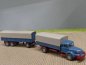 Preview: 1/87 Wiking Krupp Titan azurblau Planen-Hängerzug 480