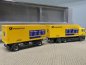 Preview: 1/87 Herpa MAN TGA Deutsche Post Wechselkoffer-Hängerzug