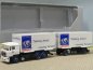 Preview: 1/87 Herpa MAN F2000 Hellmann 125years Wechselkoffer-Hängerzug