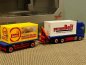 Preview: 1/87 Herpa MAN TGX XXL Flachbett HZ + Palfinger Ladekran + 2x20ft. "German Belt" + MFO"
