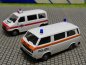 Preview: 1/87 Roco VW T3 + VW T4 Polizei Schweiz CH 2413