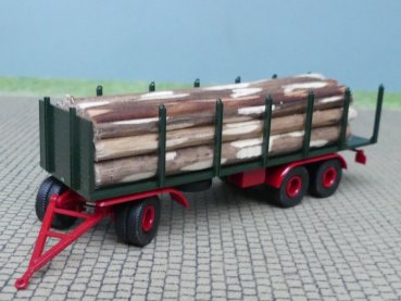 1/87 Brekina 3achs Rungenanhänger dunkelgrün mit Baumstämmen