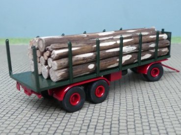 Preview: 1/87 Brekina 3achs Rungenanhänger dunkelgrün mit Baumstämmen