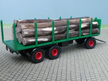 Preview: 1/87 Brekina 3achs Rungenanhänger grün mit Baumstämmen
