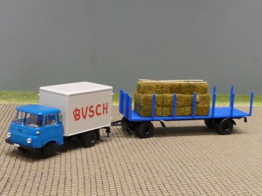 1/87 Brekina Robur 2501 Circus Busch mit Rungenanhänger+Heuballen 30612
