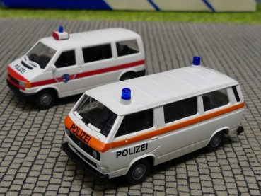 1/87 Roco VW T3 + VW T4 Polizei Schweiz CH 2413