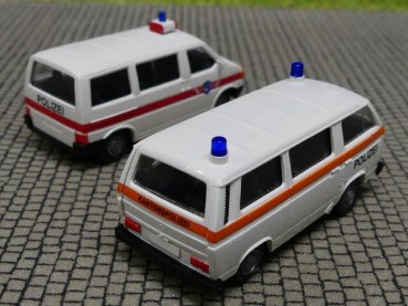 1/87 Roco VW T3 + VW T4 Polizei Schweiz CH 2413