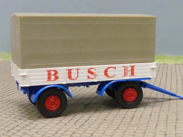 1/87 Brekina 2achs Anhänger Pritsche/Plane Circus Busch