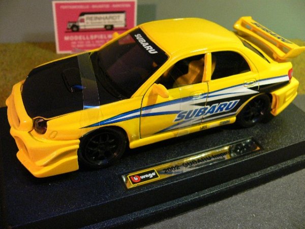 1/24 Burago Subaru Impreza WRX 2002  gelb-schwarz  23006