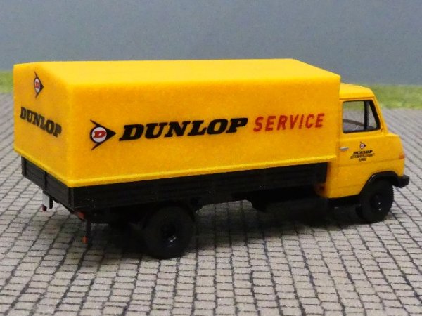 1/87 Brekina Hanomag Henschel F55 Dunlop Pritsche Plane 37504