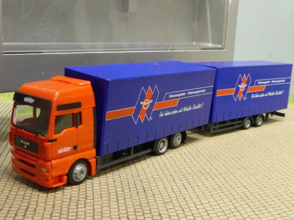 1/87 Herpa MAN TGX XXL Winkler Fahrzeugteile Gardienenplanen-Hängerzug